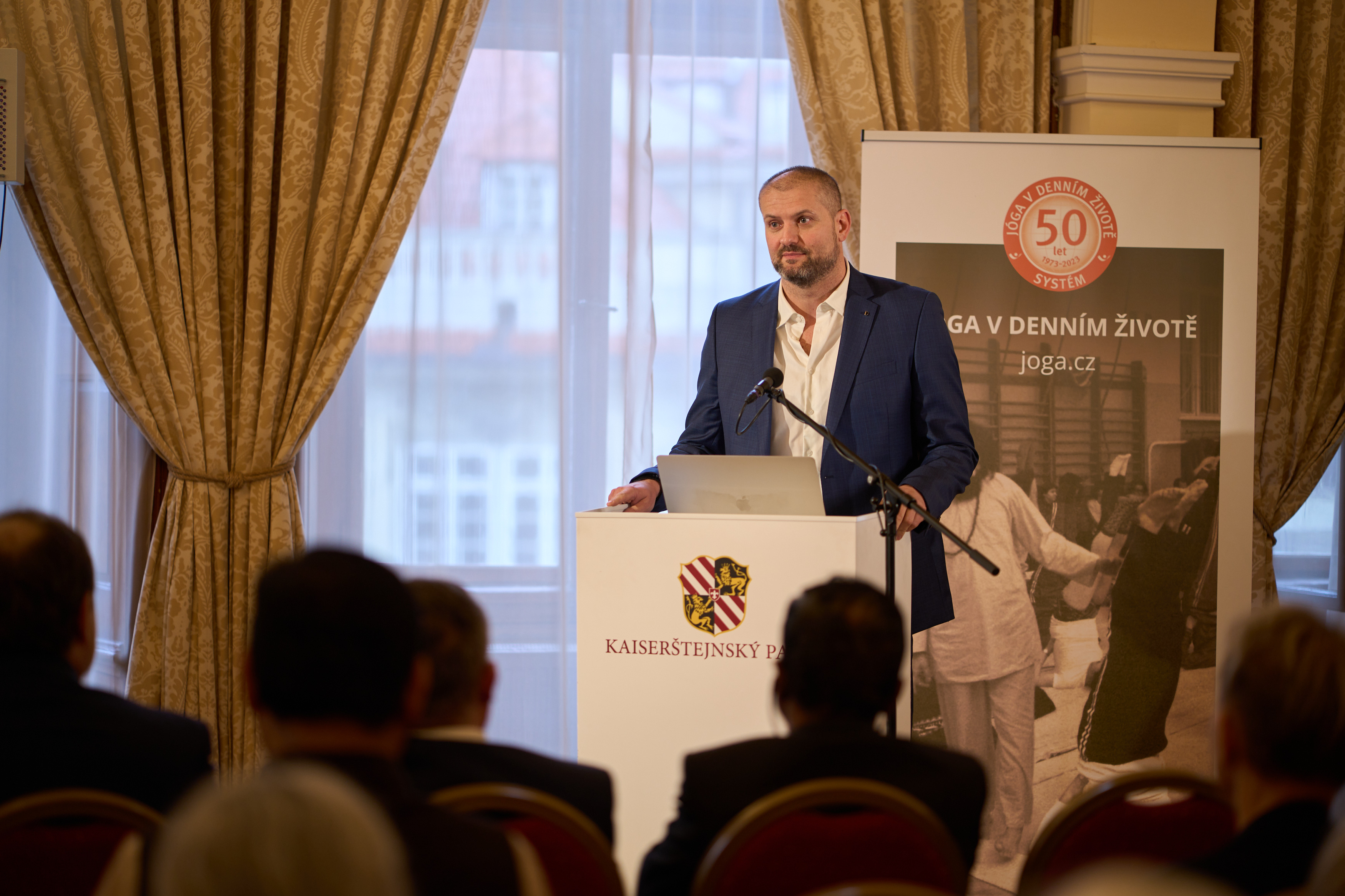 Dean of Faculty of Physical Education and Sport at Charles University speaks at the celebration opening